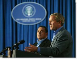 President George W. Bush and President Hosni Mubarak of Egypt discuss peace in the Middle East during a joint press conference at the President's ranch in Texas Monday, April 12, 2004.   White House photo by Eric Draper