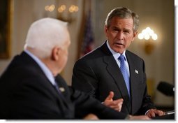 President George W. Bush and Israeli Prime Minister Ariel Sharon during a press conference in the Cross Hall of the White House on April 14, 2004.   White House photo by Paul Morse