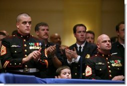 Local military and emergency first responders listen to President George W. Bush talk about the USA Patriot Act in Hershey, Pa., Monday, April 19, 2004.  White House photo by Paul Morse