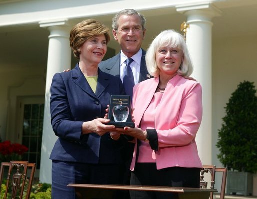 President George W. Bush and First Lady Mrs. Laura Bush with Kathleen Mellor the 2004 Teacher of the Year from South Kingstown, Rhode Island in the Rose Garden of the White House on April 21, 2004. White House photo by Paul Morse