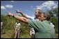 President George W. Bush tours Rookery Bay National Estuarine Research Reserve with its director Gary Lytton in Naples, Fla., Friday, April 22, 2004. "Of all the coastal wetlands in the lower 48 states, 20 percent are right here in Florida. This is a legacy we need to protect and pass along," said the President in his remarks. White House photo by Eric Draper