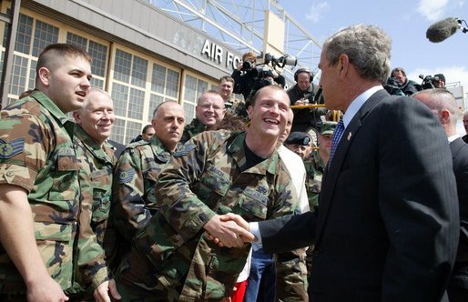 President George W. Bush greets base personnel of the 934th Airlift Wing of the Air National Guard at Minneapolis-St. Paul International Airport in Minneapolis, Minn., Monday, April 26, 2004. White House photo by Paul Morse.