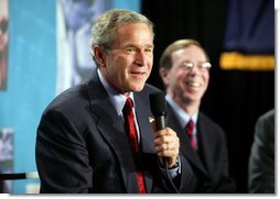 President George W. Bush participates in a conversation on the benefits of health care information technology with Dennis Smith of VA Maryland Health Care System at the Department of Veterans Affairs Medical Center in Baltimore, Maryland on April 27, 2004.  White House photo by Paul Morse