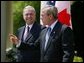 President George W. Bush and Canadian Prime Minister Paul Martin respond to questions from the press corps in the Rose Garden after a meeting at the White House on April 30, 2004. White House photo by Paul Morse