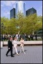 Laura Bush tours 'The Gardens of Remembrance' with New York City Mayor Michael Bloomberg and Mrs. Warrie Price, Founder and President of The Battery Conservancy in New York's Battery Park, Monday, May 10, 2004. 'The Gardens of Remembrance' honor the survivors, those who lost their lives and all those seeking solace and hope from the September 11th terrorist attacks. White House photo by Tina Hager