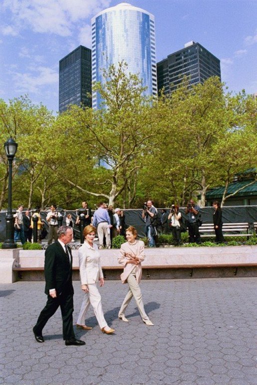 Laura Bush tours 'The Gardens of Remembrance' with New York City Mayor Michael Bloomberg and Mrs. Warrie Price, Founder and President of The Battery Conservancy in New York's Battery Park, Monday, May 10, 2004. 'The Gardens of Remembrance' honor the survivors, those who lost their lives and all those seeking solace and hope from the September 11th terrorist attacks. White House photo by Tina Hager