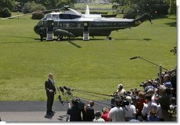 President George W. Bush makes a statement to the press about the killing of U.S. civilian Nicholas Berg on the South Lawn Wednesday, May 12, 2004. "I want to express my condolences to the family and friends of Nicholas Berg. Nicholas Berg was an innocent civilian who was in Iraq to help build a free Iraq. There is no justification for the brutal execution of Nicholas Berg -- no justification whatsoever," said the President.  White House photo by Eric Draper