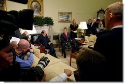 President George W. Bush and Prime Minister Silvio Berlusconi of Italy make a joint statement to the press in the Oval Office Wednesday, May 19, 2004. The two leaders discussed the development of a strategy for the full transfer of sovereignty to an interim Iraqi government June 30.  White House photo by Joyce Naltchayan