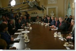 President George W. Bush answers reporters' questions during a Cabinet Meeting at the White House Wednesday, May 19, 2004.  White House photo by Joyce Naltchayan