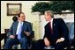 President George W. Bush meets with Prime Minister Konstandinos Karamanlis of Greece in the Oval Office Thursday, May 20, 2004. White House photo by Joyce Naltchayan