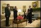 President George W. Bush and Vice President Dick Cheney meet with Secretary of Defense Donald Rumsfeld and General John Abizaid, Combatant Commander of the U.S. Central Command, in the Oval Office Thursday, May 20, 2004. White House photo by Eric Draper