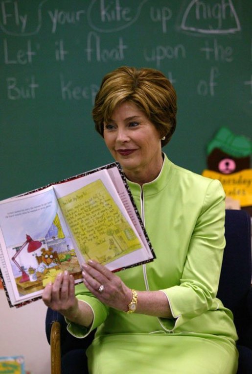 Laura Bush reads Arthur Writes a Story by Marc Brown to Ms. Valdez's first grade reading class at Reginald Chavez Elemantary School in Albuquerque, N.M., Thursday, May 20, 2004. During her visit, Mrs. Bush encouraged children to keep reading throughout the summer. White House photo by Tina Hager