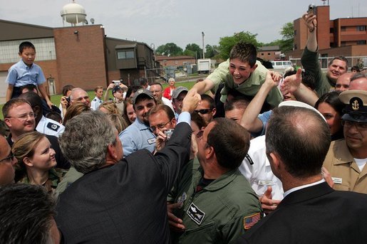 President George W. Bush greets military personnel and their families at Youngstown Air Reserve Station in Vienna, Ohio, Tuesday May 25, 2004. White House photo by Paul Morse