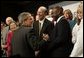 President George W. Bush greets the audience after participating in a conversation on health care and community health centers at Youngstown State University in Youngstown, Ohio, Tuesday May 25, 2004. White House photo by Paul Morse