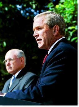 President George W. Bush participates in a joint media availability with Prime Minister of Australia John Howard in the Rose Garden Thursday, June 3, 2004.  White House photo by Joyce Naltchayan