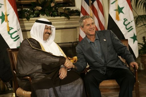 President George W. Bush shakes hands with new Iraqi President Ghazi al-Yawer at the G8 Summit on Sea Island, Ga., Wednesday, June 9, 2004. White House photo by Eric Draper.