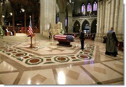 President George W. Bush bows at the casket of former President Ronald Reagan after giving an eulogy at the funeral service for President Ronald Reagan at the National Cathedral in Washington, DC on June 11, 2004.  White House photo by Eric Draper