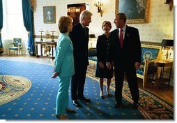 President George W. Bush and Laura Bush talk with former President Bill Clinton and Senator Hillary Clinton in the Blue Room shortly before the unveiling of the Clinton portraits in the East Room of the White House Monday, June 14, 2004.  White House photo by Paul Morse