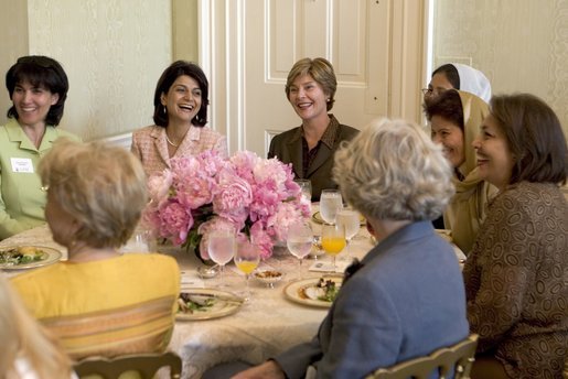 Laura Bush hosts a luncheon for the U.S.-Afghan Women's Council in the Family Dining Room located in the private living quarters of the White House Tuesday, June 15, 2004. Pictured with Mrs. Bush are, clockwise from left: the Honorable Zohra Rasekh, Mrs. Shamim Jawad, Dr. Habiba Sarabi, Ms. Shukria Amani, the Honorable Shirin Tahir-Kheli, Mrs. Joyce Rumsfeld and Ms. Patricia Mitchell. White House photo by Tina Hager.