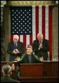 Vice President Dick Cheney and Speaker of the House Dennis Hastert (R-IL), right, welcome Afghanistan President Hamid Karzai, center, before he addresses the joint meeting of Congress on Capitol Hill Tuesday, June 15, 2004. White House photo by David Bohrer.