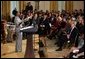 Dione Taylor sings with the Billy Taylor Trio as part of a reception for Black Music Month held in the East Room of the White House on June 22, 2004. White House photo by Paul Morse