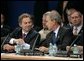 Minutes after the Coalition Provisional Authority transferred authority to Iraq's interim government, President George W. Bush and British Prime Minister Tony Blair shake hands during a work session at the NATO Summit in Istanbul, Turkey, Monday, June 28, 2004. White House photo by Eric Draper.