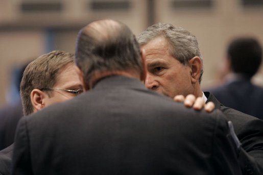 President George W. Bush talks with French President Jacques Chirac during the NATO Summit at the Istanbul Convention and Exhibition Center in Turkey, Monday, June 28, 2004. White House photo by Eric Draper.