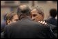 President George W. Bush talks with French President Jacques Chirac during the NATO Summit at the Istanbul Convention and Exhibition Center in Turkey, Monday, June 28, 2004. White House photo by Eric Draper.