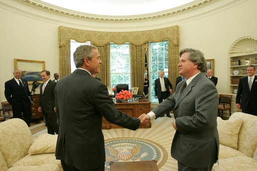 President George W. Bush meets with the Prime Minister David Oddsson of Iceland in the Oval Office Tuesday, July 6, 2004. White House photo by Eric Draper.