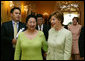 Laura Bush greets Azadsurengiin Oyunbileg, wife of President Natsagiyn Bagabandi of Mongolia, in the Yellow Oval Room Friday, July 16, 2004. White House photo by Joyce Naltchayan