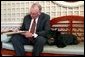 Barney observes astronaut Neil Armstrong respond to questions for "Ask the White House" in the White House Garden Room Wednesday, July 21, 2004. White House photo by Alex Cooney.