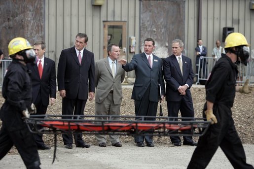 President George W. Bush observes a demonstration by first responders at Northeastern Illinois Public Training Academy in Glenview, Illinois on Thursday July 22, 2004. White House photo by Paul Morse.