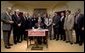 President George W. Bush signs H.R. 218, the Law Enforcement Officers Safety Act of 2004," which exempts qualified active and retired law enforcement officers from State laws that prohibit the carrying of concealed firearms, in the Roosevelt Room Thursday, July 22, 2004. White House photo by Tina Hager.