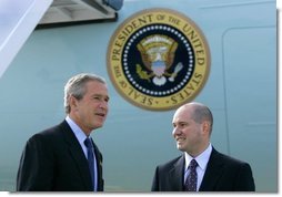 President George W. Bush meets with Freedom Corps Greeter Eric Rasmussen at Detroit Metropolitan Wayne County Airport, Friday, July 23, 2004. Rasmussen, a volunteer with the Tax Assistance Program at the Volunteer Accounting Service Team of Michigan, is the 300th USA Freedom Corps Greeter, since the President began greeting outstanding volunteers in communities across America in March 2002. White House photo by Eric Draper.