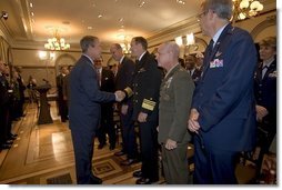 President George W. Bush greets military personnel after signing H.R.4613, The Defense Appropriations Act for Fiscal Year 2005, in the Dwight D. Eisenhower Executive Office Building Thursday, Aug. 5, 2004.   White House photo by Eric Draper