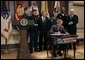 President George W. Bush signs H.R.4613, The Defense Appropriations Act for Fiscal Year 2005, in the Dwight D. Eisenhower Executive Office Building Thursday, Aug. 5, 2004. White House photo by Eric Draper