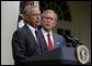 Standing with President George W. Bush, Rep. Porter Goss, R-Fla., addresses the media after the President nominated him to be the director of the CIA in the Rose Garden, Tuesday, Aug. 10, 2004. White House photo by Joyce Naltchayan.