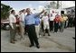 President George W. Bush addresses the press during a visit to Martin County Red Cross Headquarters in Stuart, Fla., Thursday, Sept. 30, 2004. "I appreciate the strong leadership of the -- of those who represent the armies of compassion,"said the President. "I'm proud to stand with the men and women of the Red Cross, the Salvation Army and other faith-based and community groups that are providing important relief." White House photo by Eric Draper