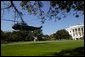 After addressing the media, President George W. Bush departs the South Lawn aboard Marine One Thursday, Oct. 7, 2004. White House photo by Tina Hager