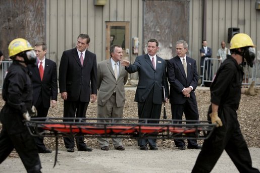 President George W. Bush observes a demonstration by first responders at Northeastern Illinois Public Training Academy in Glenview, Illinois, July 22, 2004. White House photo by Paul Morse