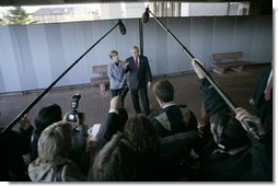 President George W. Bush and Laura Bush meet with the press after visiting with wounded soldiers and their families at Walter Reed Army Medical Center in Washington, D.C., Tuesday, Nov. 9, 2004.  White House photo by Eric Draper