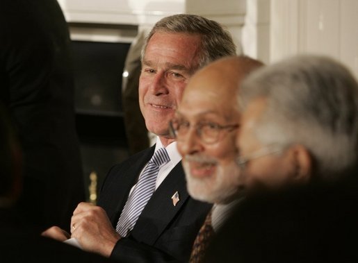 President George W. Bush attends the Iftaar Dinner with Ambassadors and Muslim Leaders in the State Dining Room of the White House, Nov. 10, 2004. White House photo by Paul Morse