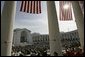 President George W. Bush honors Veterans Day in a speech at Arlington National Cemetery Nov. 11, 2004. "Twenty-five million military veterans walk among us, and on this day, our nation thanks them all," said the President. "These are the hidden heroes of a peaceful nation: our colleagues and friends, neighbors and family members who answered the call and returned to live in the land they defended." White House photo by Tina Hager