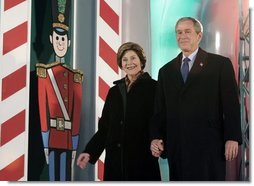 President George W. Bush and Laura Bush arrive at the Pageant of Peace to light the National Christmas Tree on the Ellipse near the White House Dec. 2, 2004.  White House photo by Paul Morse