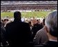 President George W. Bush looks up into the stands at Lincoln Financial Field during the 2004 Army/Navy football game in Philadelphia, Pa., Dec. 4, 2004. White House photo by Tina Hager