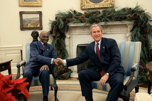 President George W. Bush meets with President Abdoulaye Wade of Senegal in the Oval Office, Monday, Dec. 6, 2004. White House photo by Tina Hager