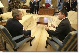 President George W. Bush meets with his Majesty King Abdullah of the Hashemite Kingdom of Jordan in the Oval Office, Monday, Dec. 6, 2004.  White House photo by Eric Draper