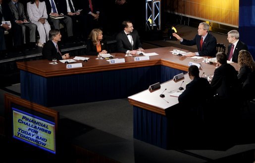 President George W. Bush speaks to panelists at the White House Conference on the Economy at the Ronald Reagan Building and International Trade Center in Washington, D.C., Thursday, Dec. 16, 2004. White House photo by Paul Morse