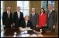 President George W. Bush signs an executive order on the establishment of the Committee on Ocean Policy in the Oval Office Friday, Dec. 17, 2004. White House photo by Paul Morse