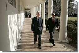 President George W. Bush walks with former President Bill Clinton along the colonnade at the White House Monday, Jan. 3, 2005. Former Presidents Clinton and George H.W. Bush are leading a nationwide charitable fundraising to aid victims of last week's earthquake and tsunamis in South Asia.  White House photo by Susan Sterner